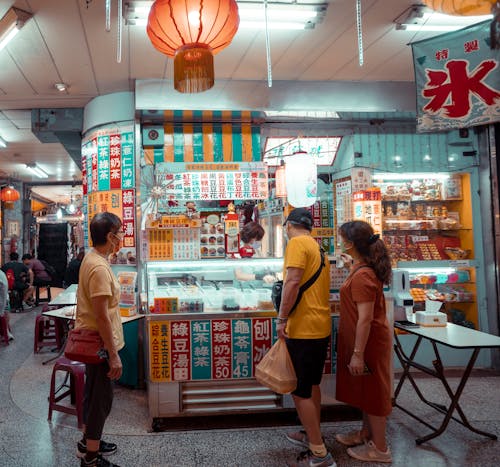 People buying on a Food Stall 