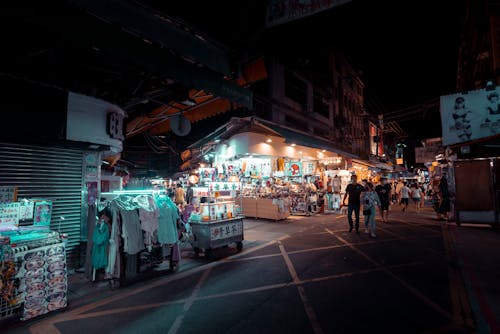 People walking in a Street of Food Stalls