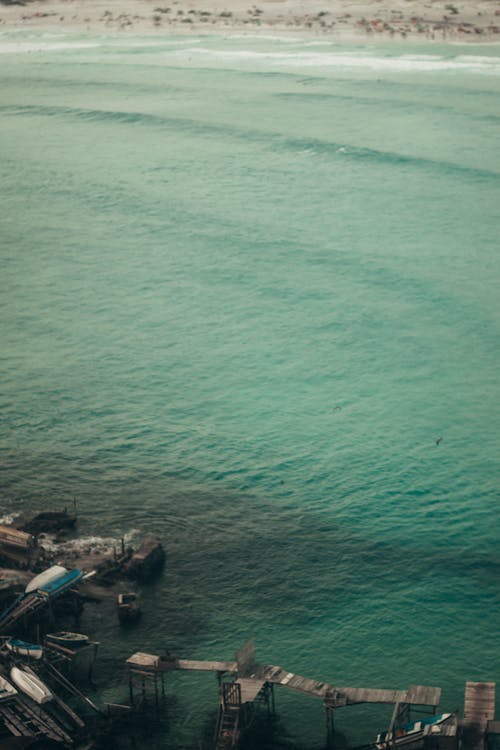 Aerial Shot of Wooden Dock on the Ocean 