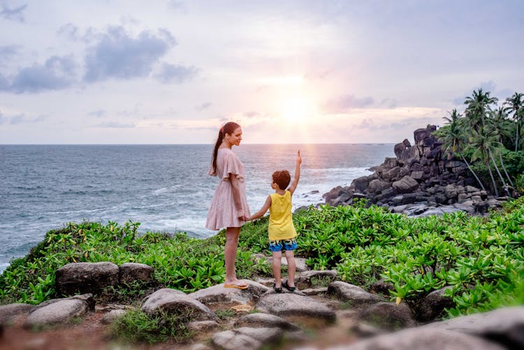 Mother And Son Holding Each Other's Hands 