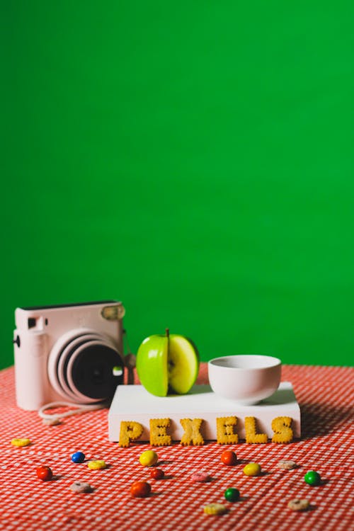 Candies and Polaroid on a Table Top 