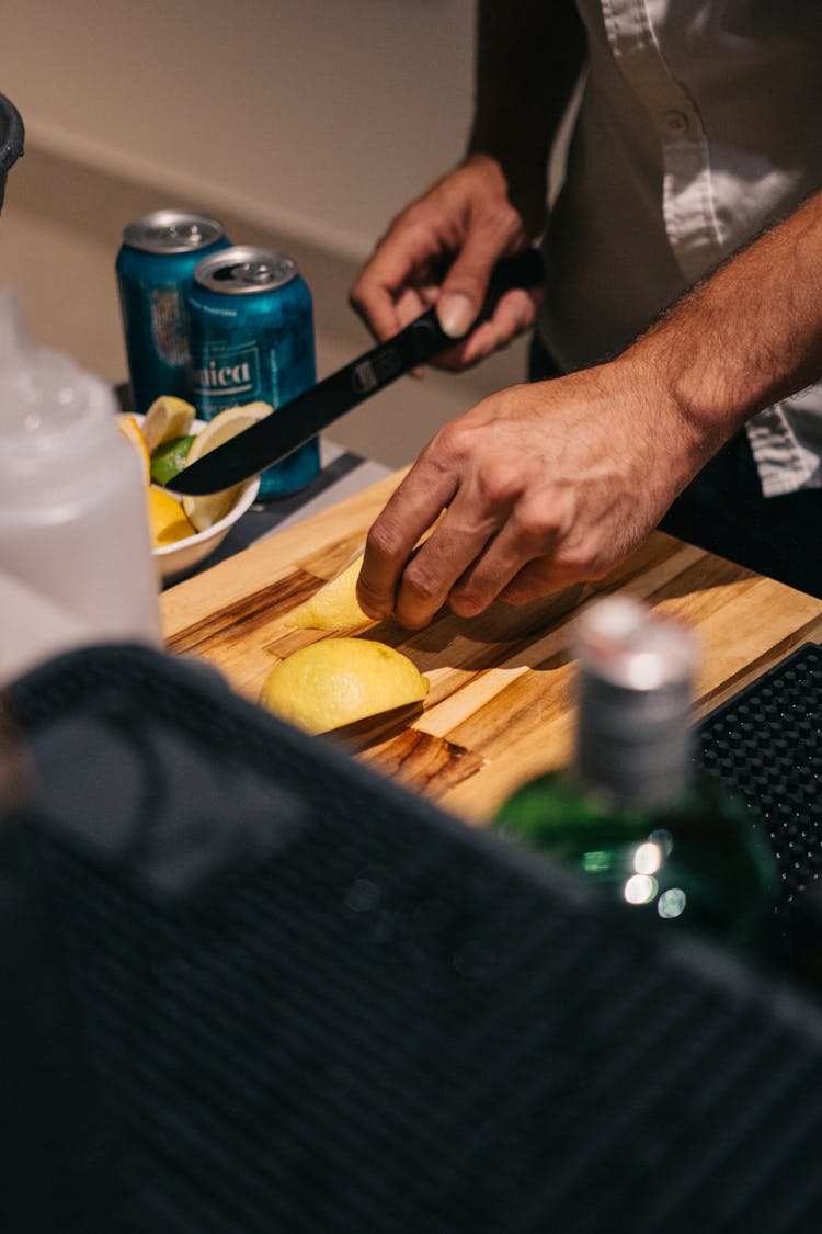 Person Slicing Lemon