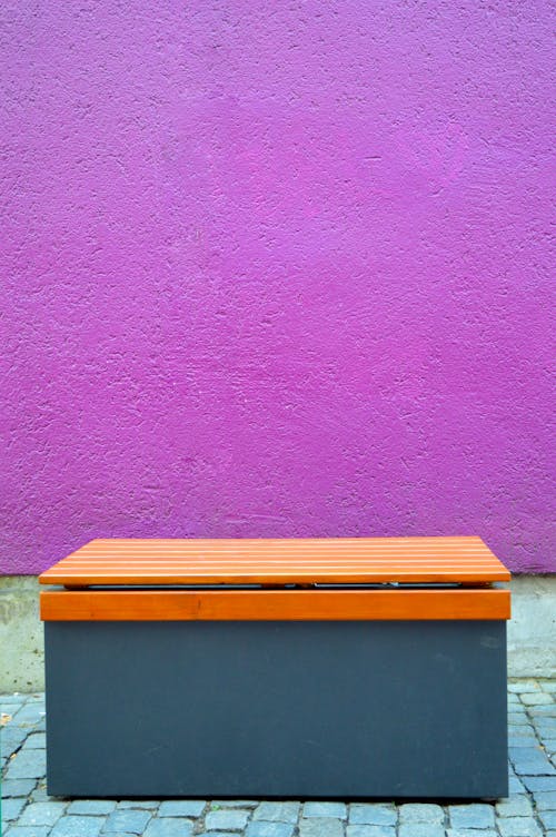 Bench beside a Purple Wall 