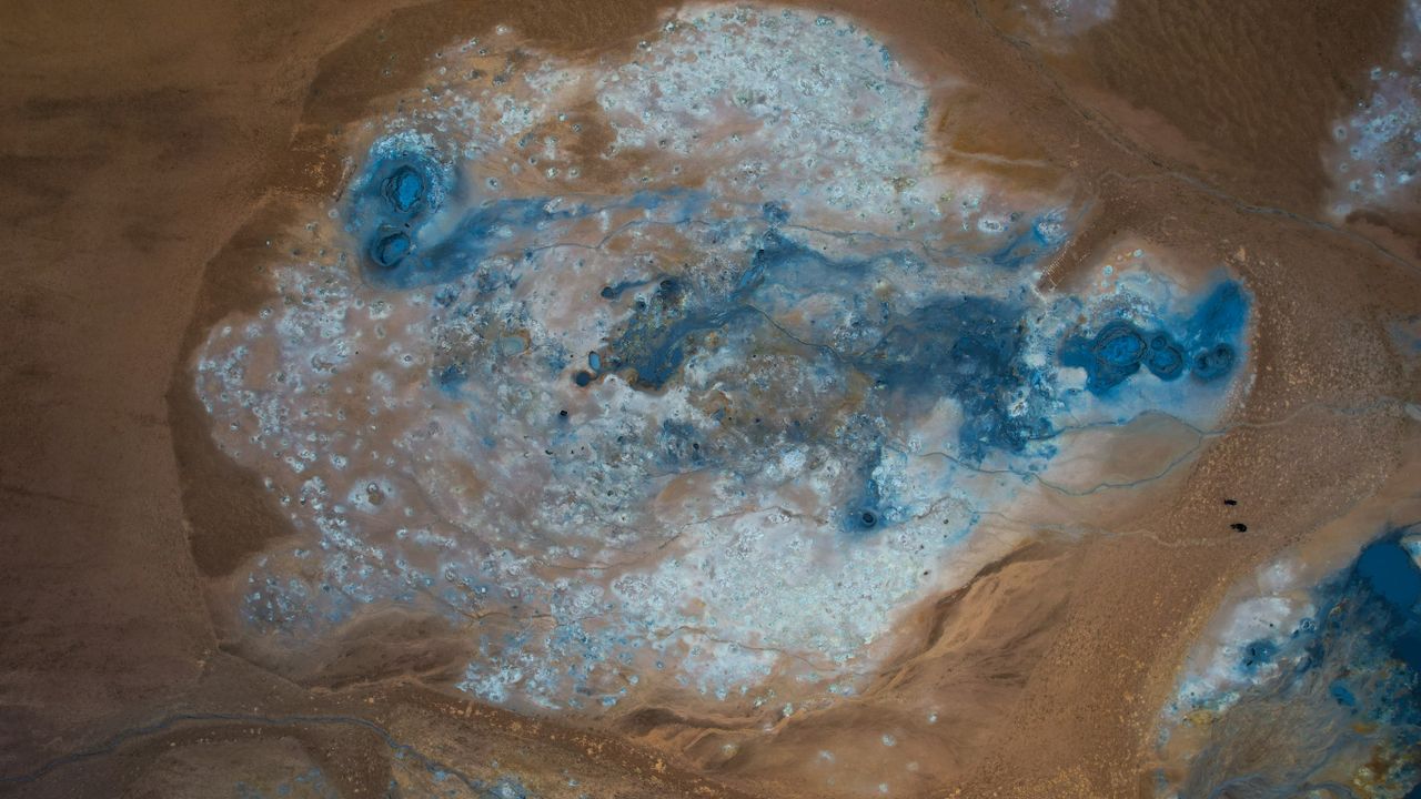 stunning aerial view of reykjahl s geothermal landscape with vivid blu
