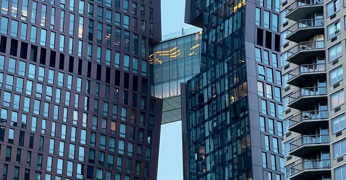 Two High Rise Building Together Sky Bridge between High-rise Buildings · Free Stock Photo