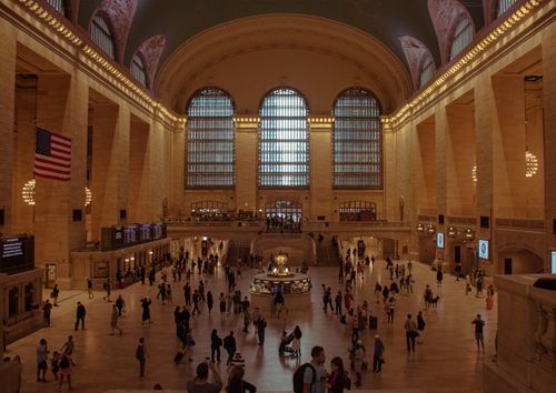 Free Bustling atmosphere in New York's iconic Grand Central Terminal with people moving through the historic interior. Stock Photo