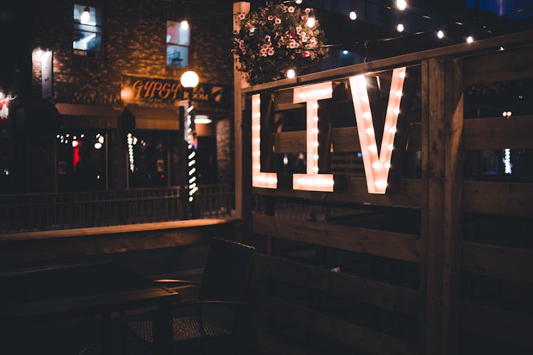 Illuminated Letters On A Wooden Partition 