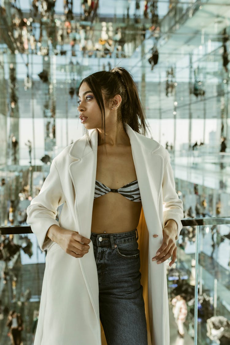 Portrait Of Woman Standing On First Floor Of Office Bui