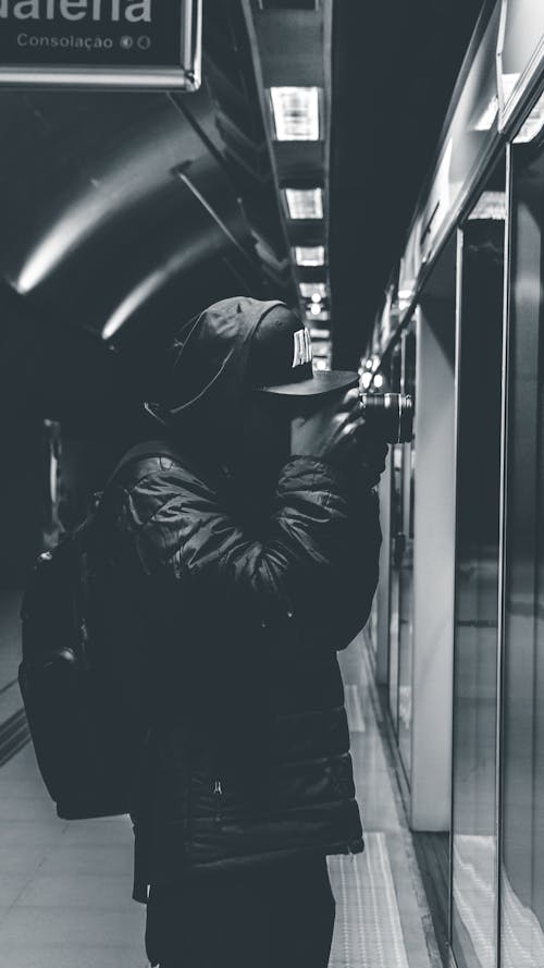 Person Taking Photo Inside Station