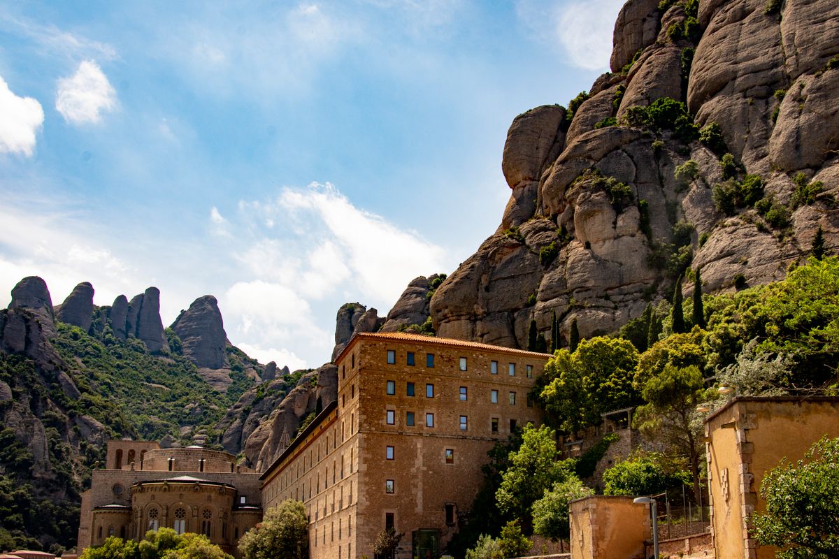 Montserrat monastery beneath the serrated mountain, Catalonia
