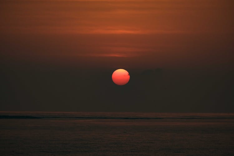 Red Sun And Dark Seascape