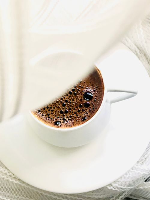 Free A hot Turkish coffee in a white ceramic cup, captured in Istanbul. Stock Photo