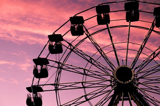 Ferris Wheel Under Orange Sky