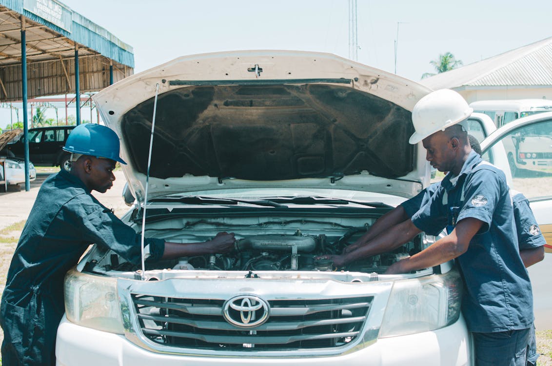 Mechanics working on a Vehicle