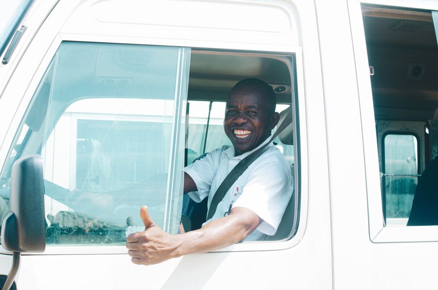 Driver smiling in a utility vehicle