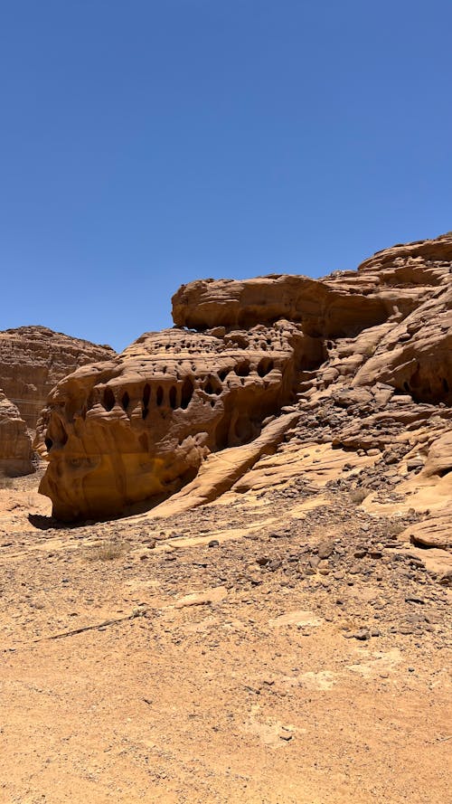 Brown Rock Formation Under Clear Blue Sky