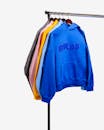 Hoodie Sweaters Hanging on Clothes Rack