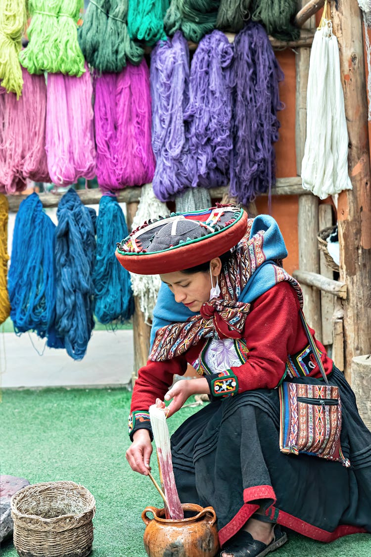 Woman Dying Wool Yarn