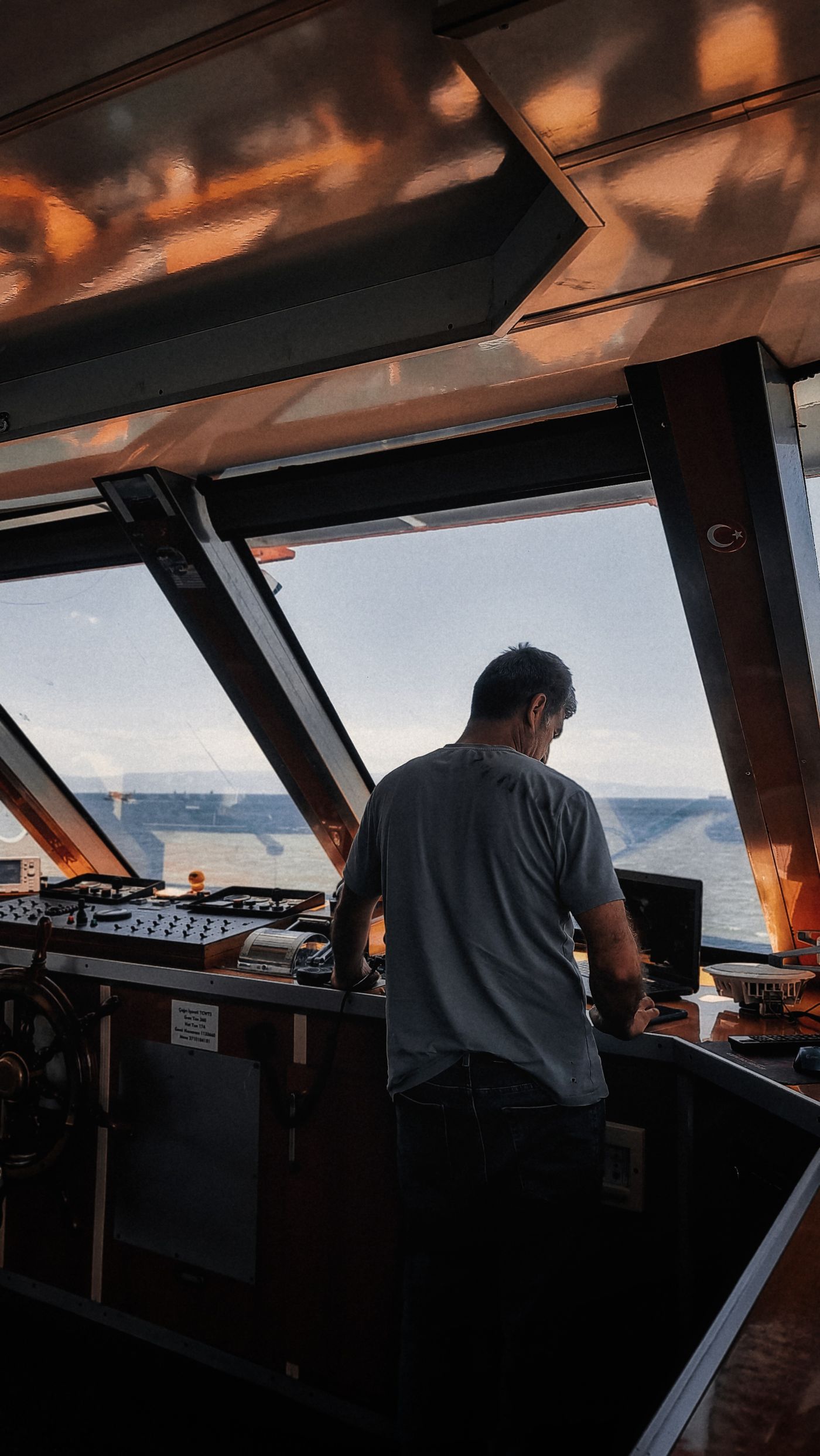 Captain navigating from the vessel bridge