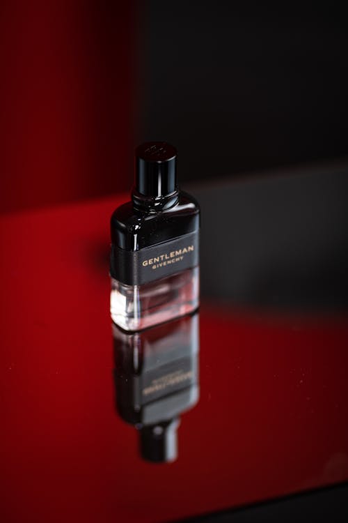 Black and Red Perfume Bottle · Free Stock Photo