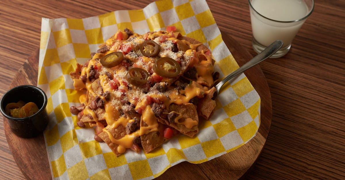 Fast Food Nachos With Stale Chips And Plastic Cheese Sauce