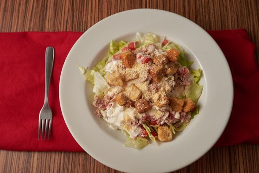 Caesar Salad on White Ceramic Plate 