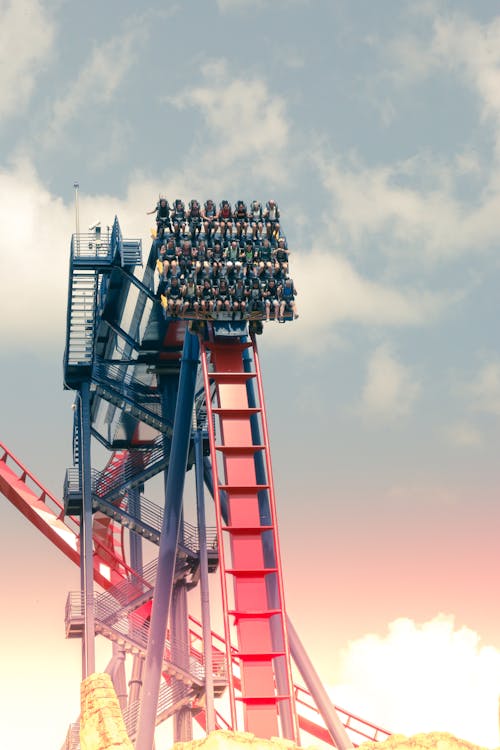 People Riding Rollercoaster