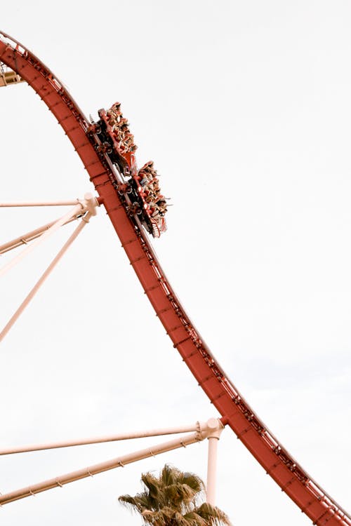 People Riding Rollercoaster