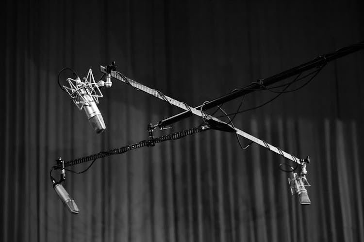 Grayscale Photo Of Overhead Drum Microphones