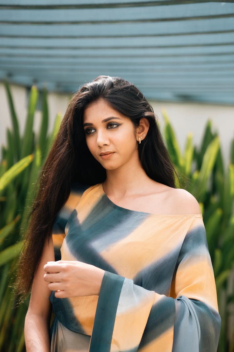 Portrait Of Beautiful Woman Wearing Geometric Dress