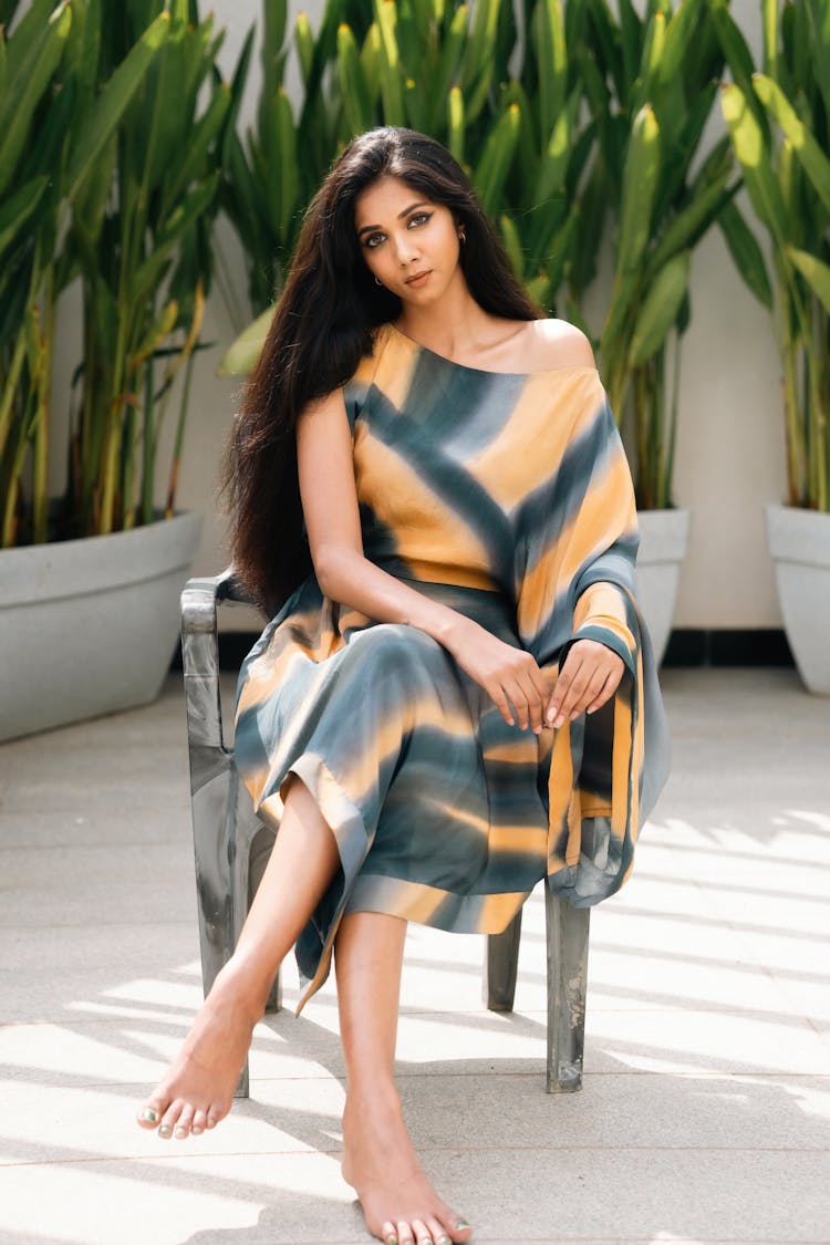 Portrait Of Beautiful Woman Wearing Geometric Dress