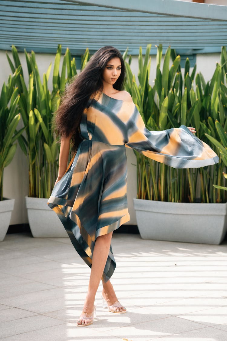 Portrait Of Beautiful Woman Wearing Geometric Dress