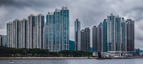 City Skyline Under Gray Cloudy Sky