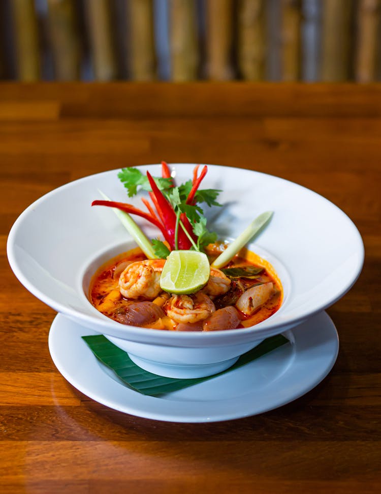 Close-up Of A Bowl Of Tom Yum Soup