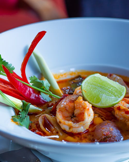 Tom Yum Soup in White Ceramic Bowl