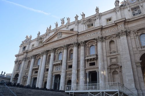 Free Grand facade of St. Peter's Basilica, showcasing beautiful architecture in Vatican City. Stock Photo