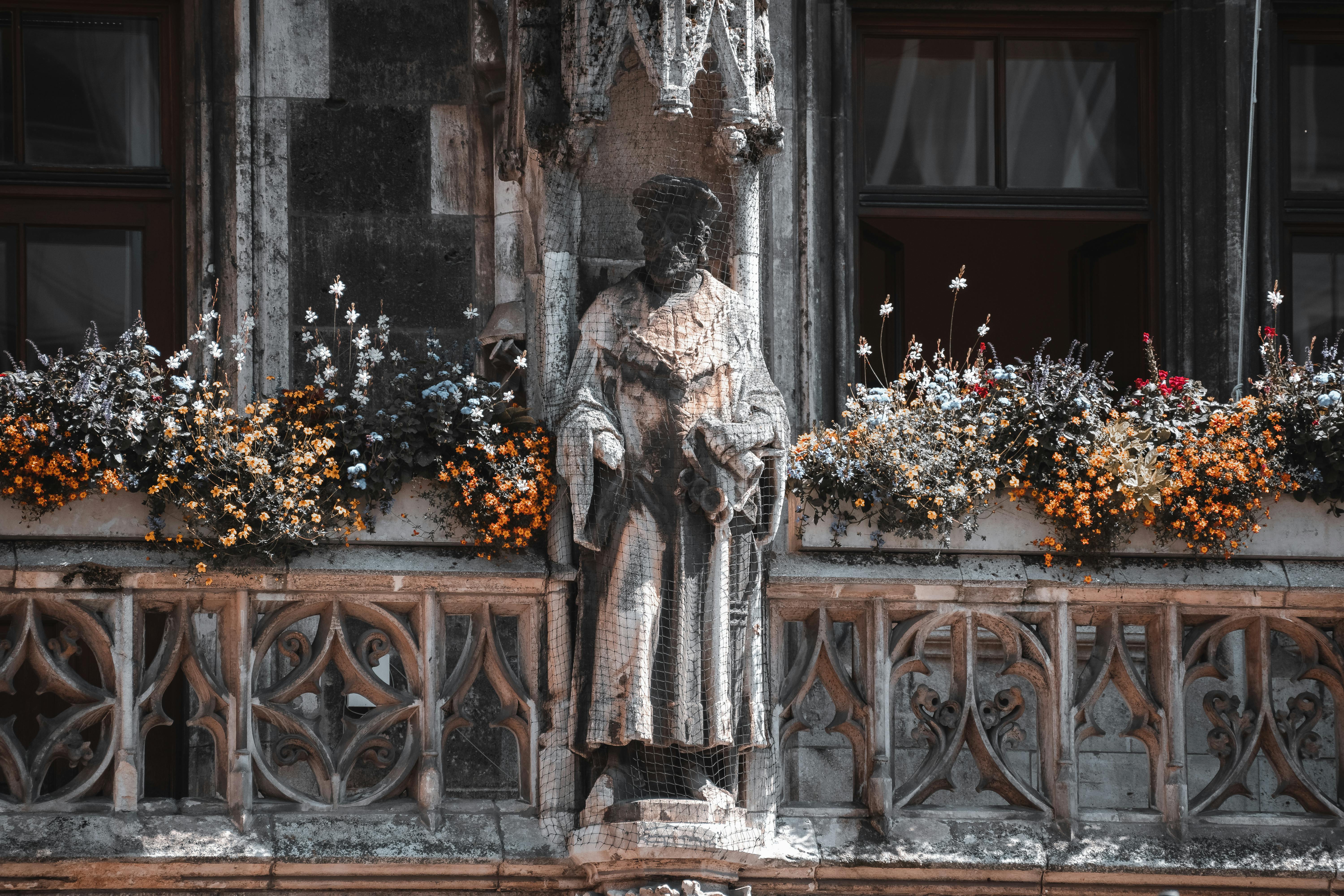 Black Concrete Statue in Close Up Shot Free Stock Photo