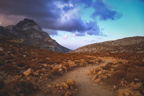 A Scenic Landscape by a Mountainside