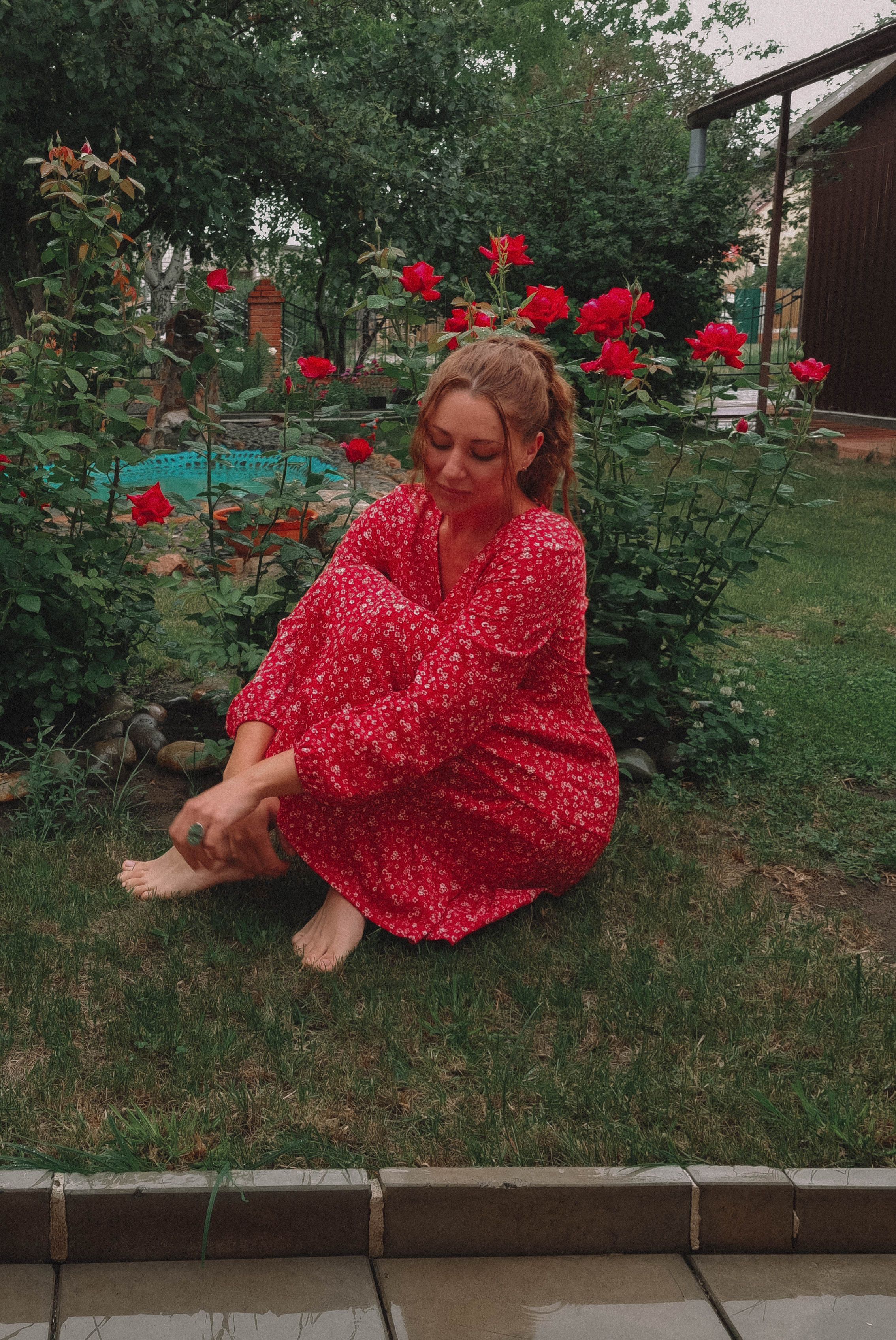 A Woman in Red Dress Sitting on Grass · Free Stock Photo