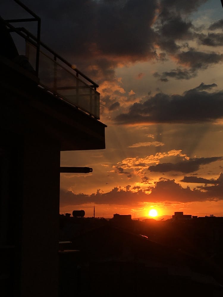 Silhouette Of Building During Sunset