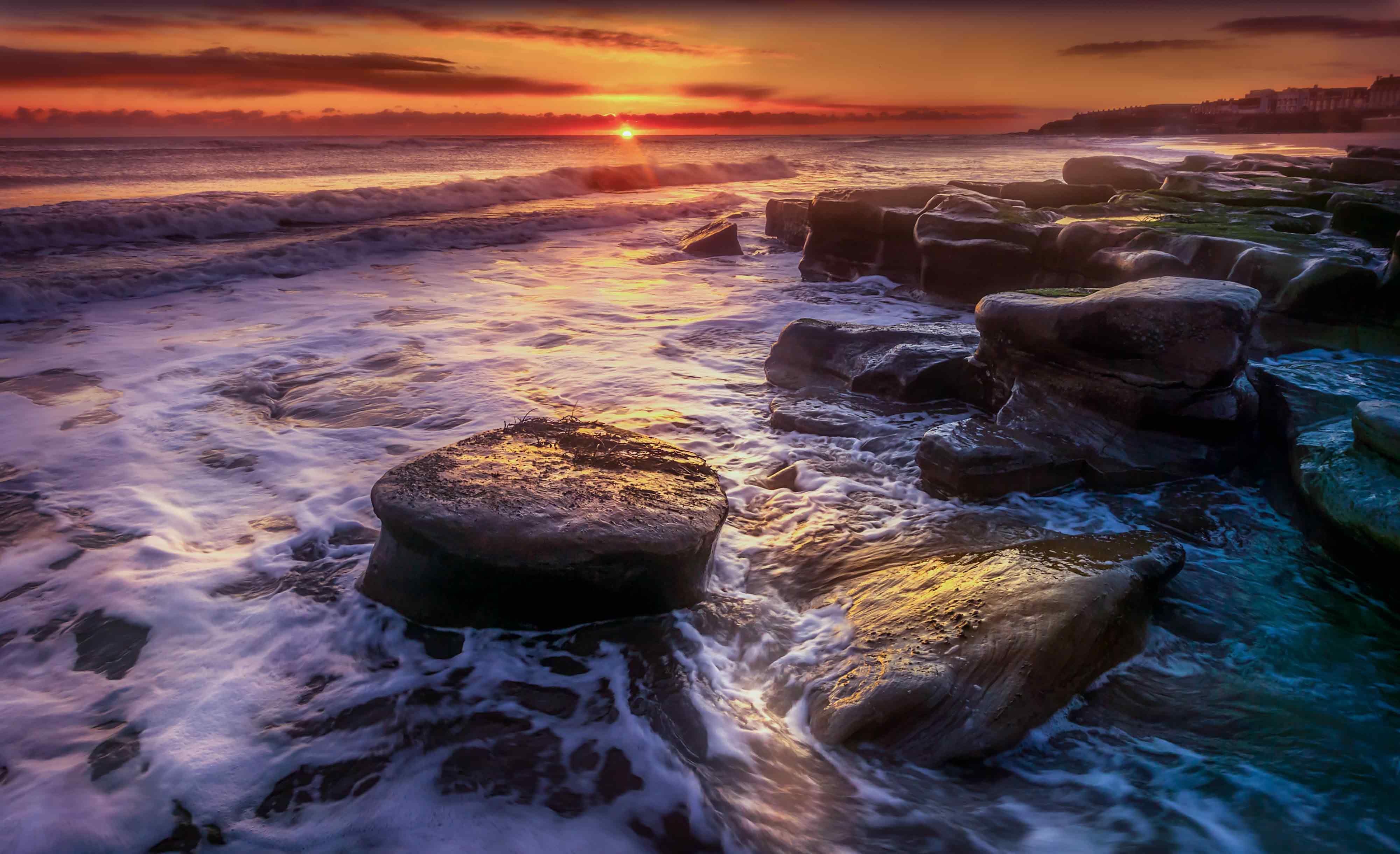 Sunset Over Sea and Rocks · Free Stock Photo