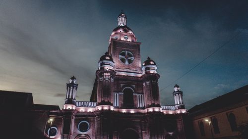 Free Illuminated facade of Iglesia San Andres at dusk in Pasto, Nariño, Colombia. Stock Photo