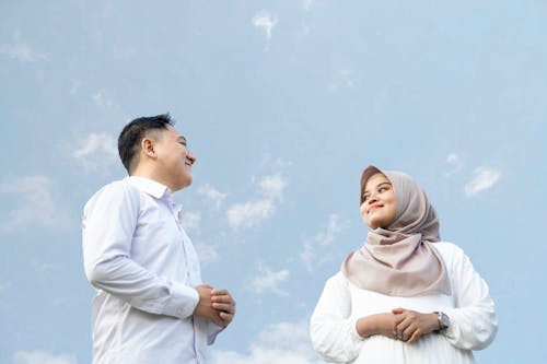 Muslim Couple Looking at Each Other and Smiling