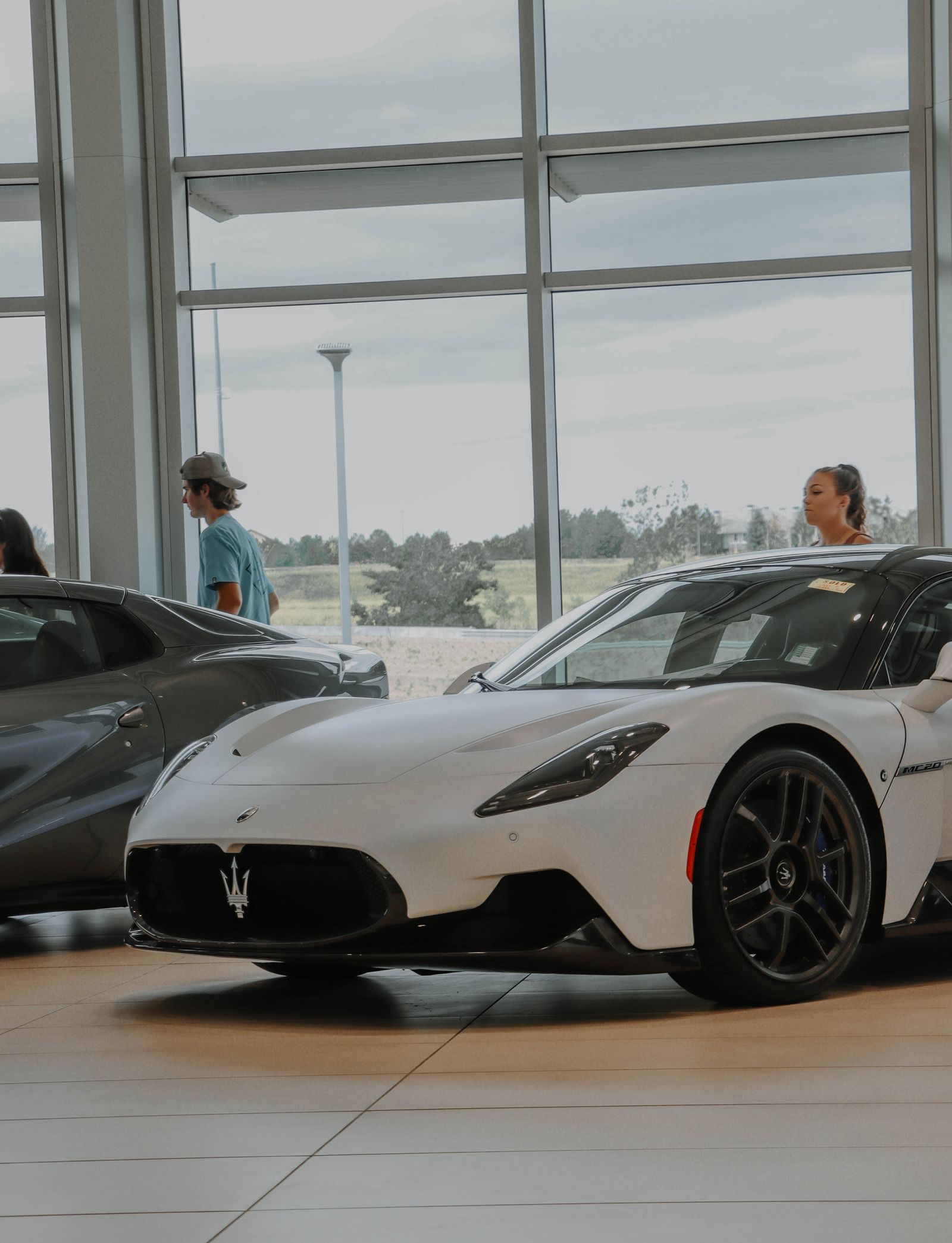 New vehicles on display in a modern car showroom