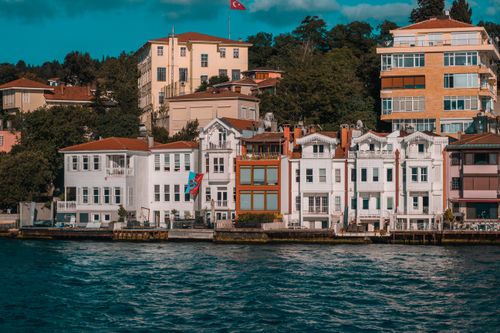 Free Vibrant buildings along the waterfront in Istanbul showcasing Turkish architecture. Stock Photo