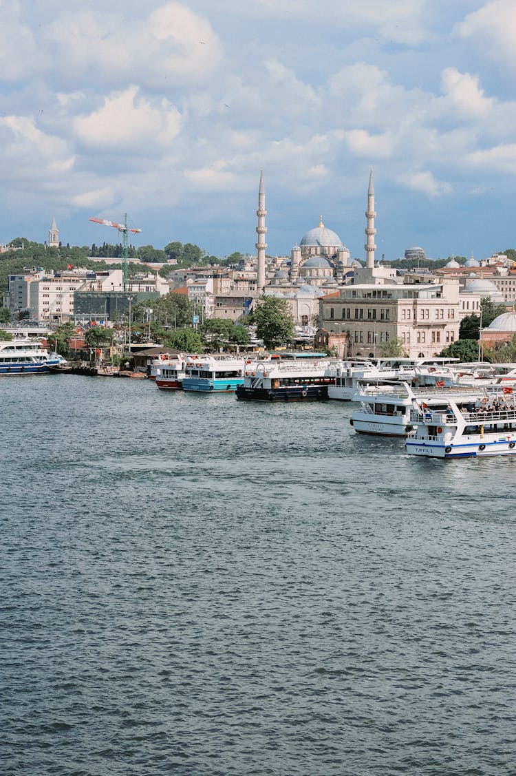 Docked Ferry Boats Near Buildings