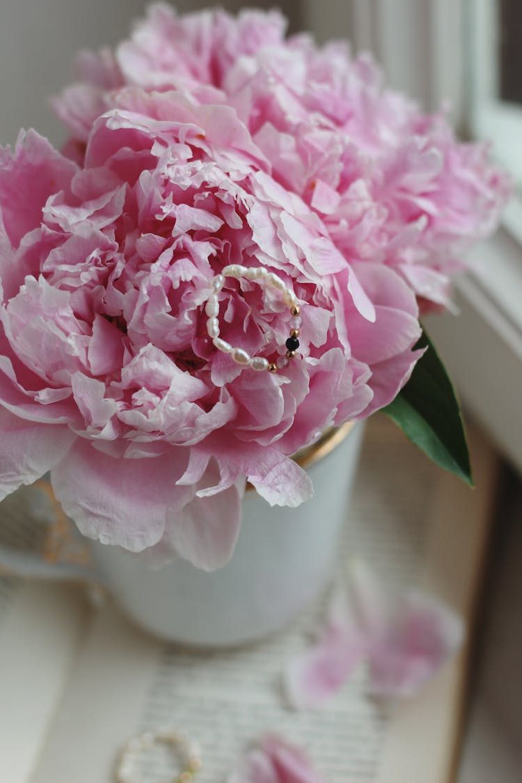 Pearl Ring On Pink Flowers