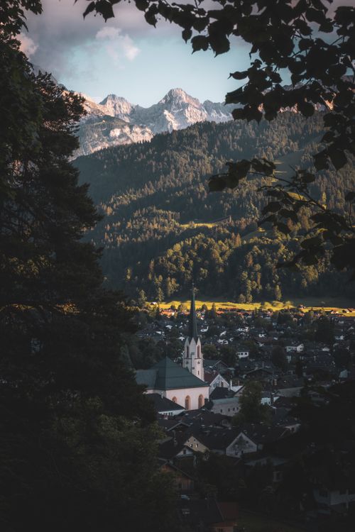 Free Breathtaking view of Garmisch-Partenkirchen with the Alps in the background at sunset, Germany. Stock Photo