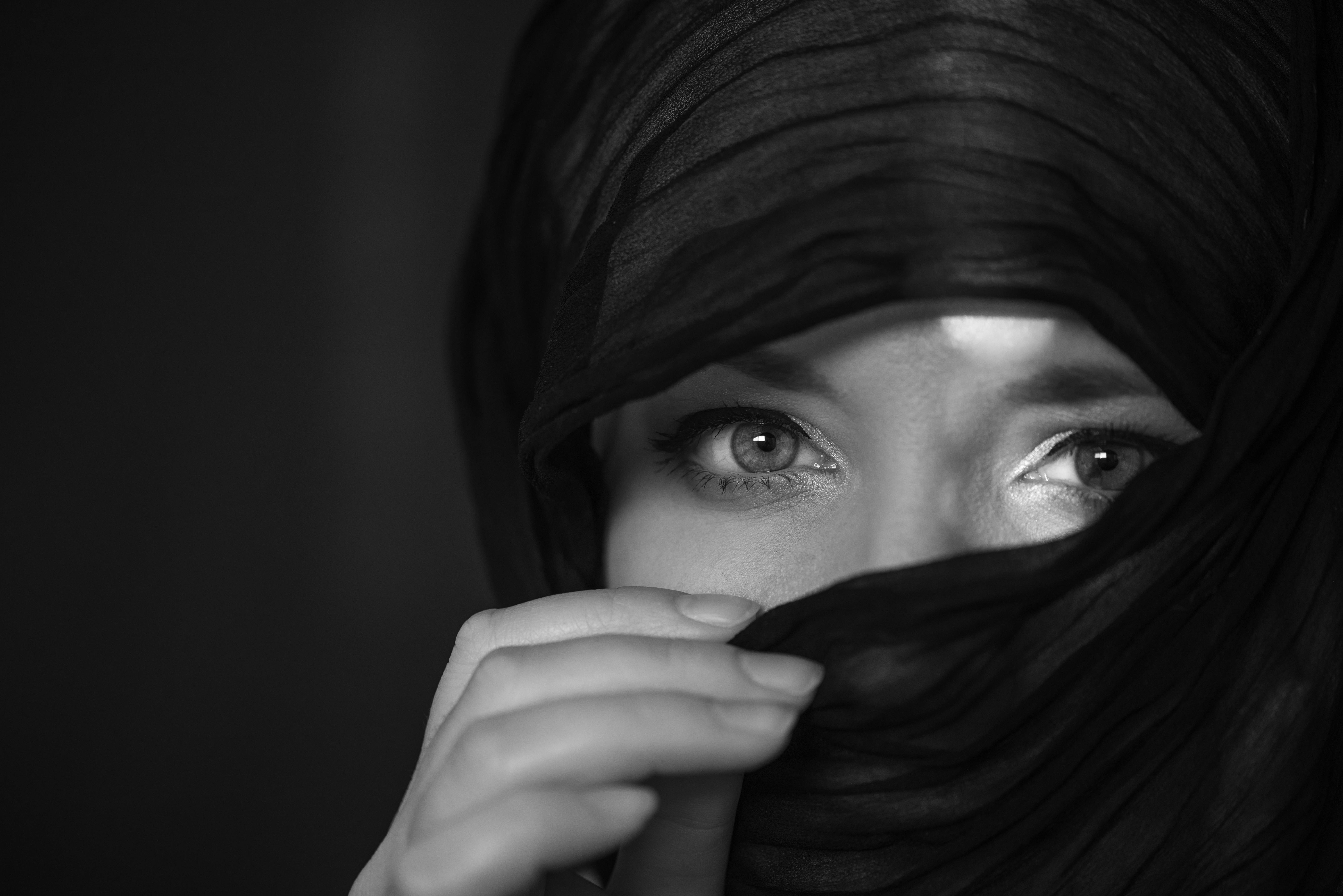 Person in Black Hijab Walking on the Street · Free Stock Photo