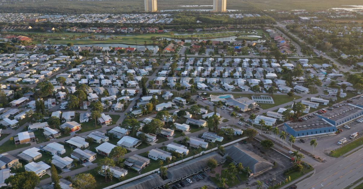 Bird's-eye view of a residential area in Fort Myers, Florida, showcasing summer urban landscape.
